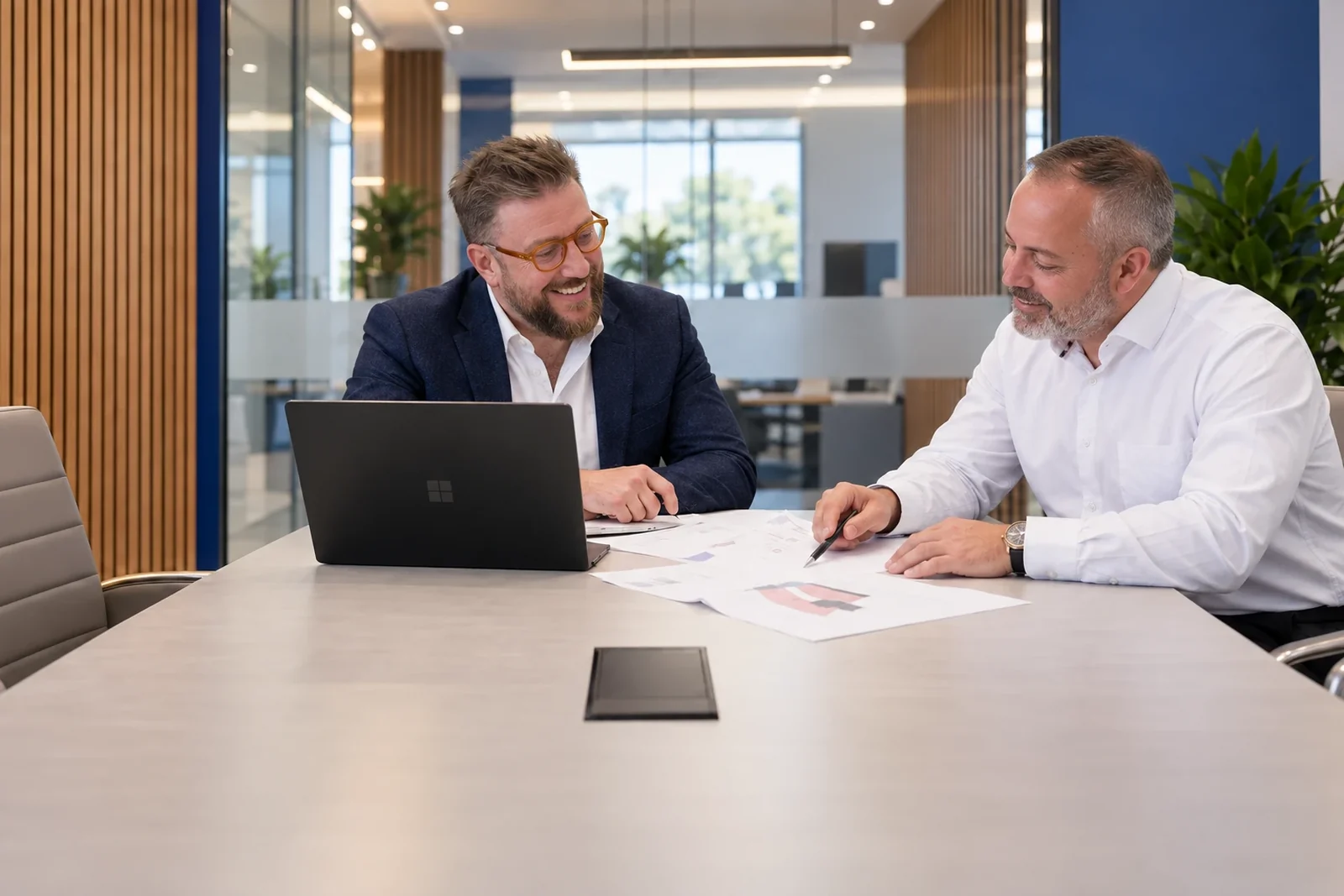 CIG colleagues reviewing a project in a meeting room