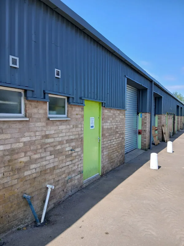 Row of industrial units with refreshed cladding and new doors