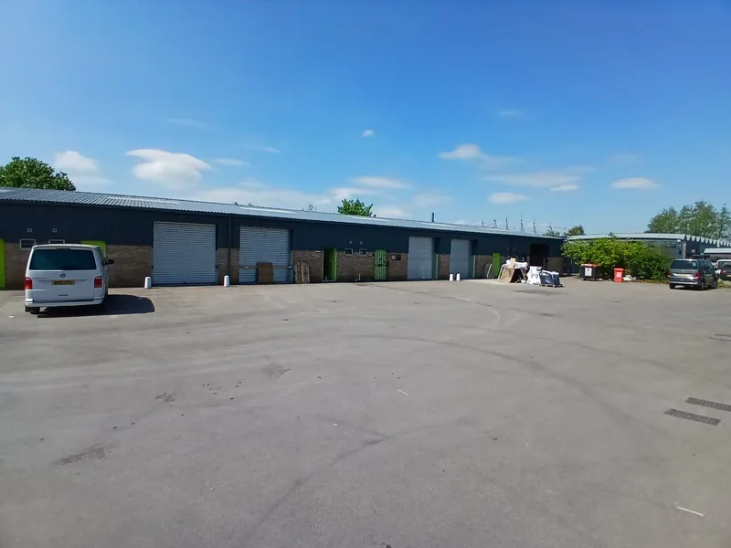 Wide view of the industrial estate with refurbished units and resurfaced yard
