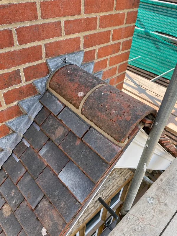 New lead valley between two pitched roof slopes